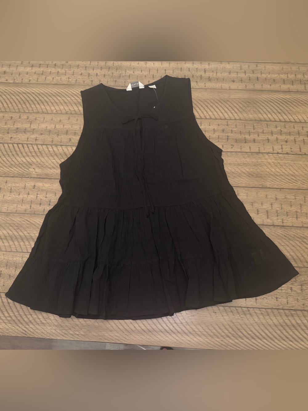 11.1 TYLHO Anthropologie Sleeveless Tiered Top with Tie Front